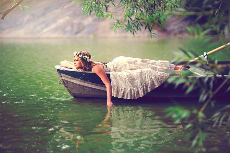 woman-river-boat